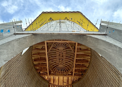 Zamora Concrete crew pouring and forming concrete for shell construction in Vero Beach