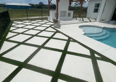 Custom-designed concrete pool deck with unique layout by Zamora Concrete