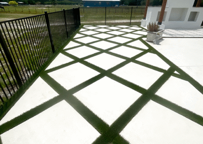 Close-up of custom concrete pool deck surface texture by Zamora Concrete