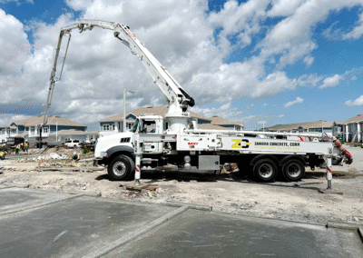 One of our concrete cranes pouring garage slabs at apartment complex in Fort Pierce, Florida by Zamora Concrete