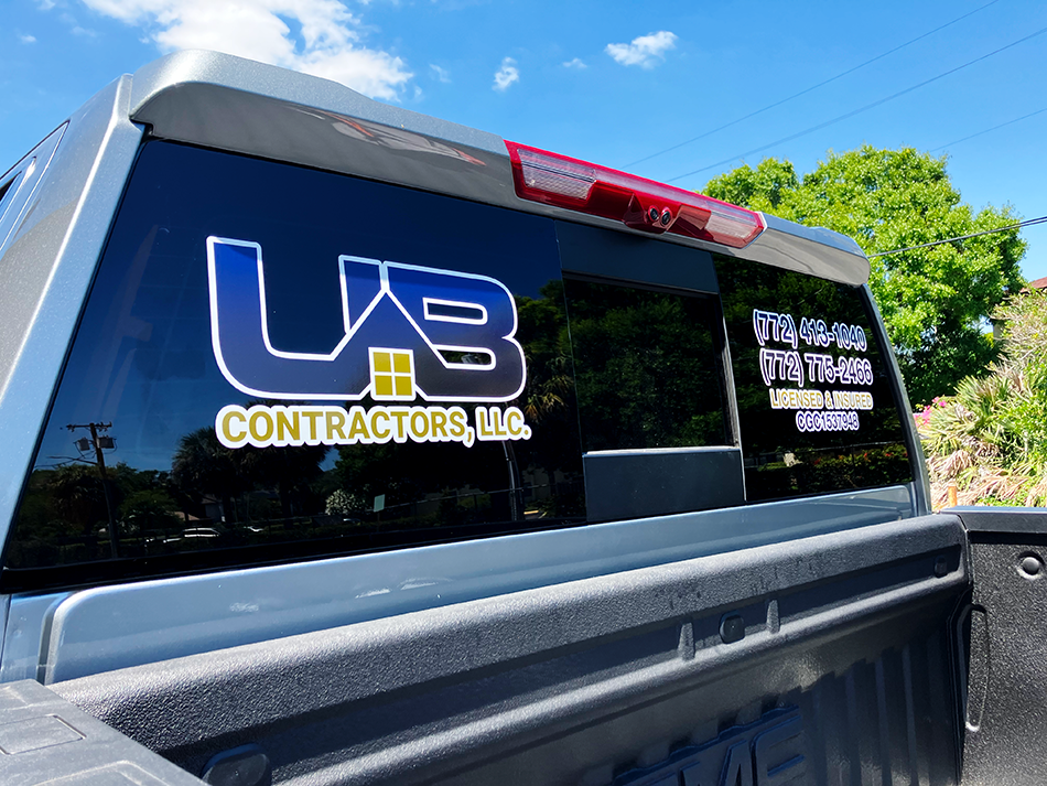 UB Contractors Truck with Logos UB Contractors branded truck showcasing company logos and construction equipment